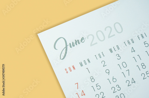 June calender 2020 on orange background with selective focus  © sukarman