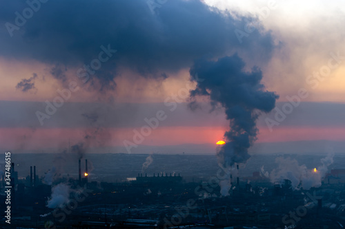 Plant view. Plant with pipes and smoke. Panorama of industrial complex. Emissions of air pollutants. smoke from the chimney