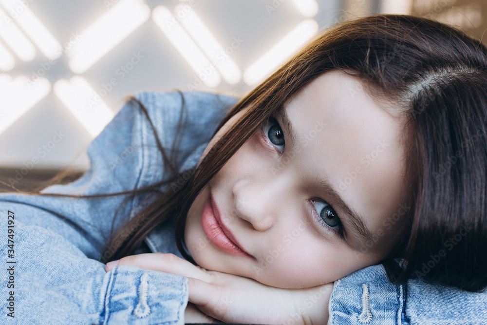Adorable bruntte cute girl. Close up baby girl portrait Adorable bruntte cute girl. Close up baby girl portrait
