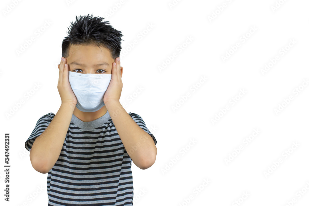 Isolated The hand holding the mask on Asian boy face on a white background with clipping path. Isolated The hand holding the mask on Asian boy face on a white background with clipping path.