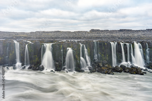 Selfoss waterfall cascades in the dettifoss area early morning in northern Iceland. Nature photography and travelling concept.