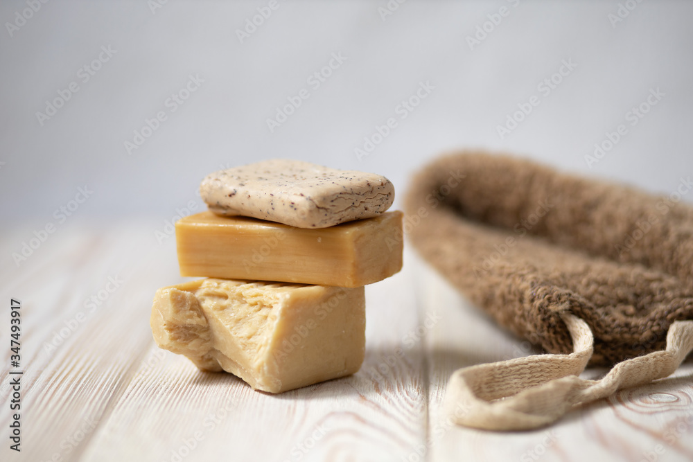 brown washcloth soap bathroom objects on a light background 