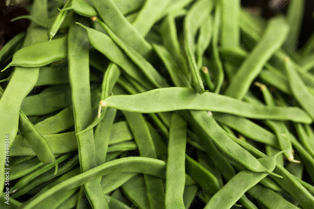 green romano beans on the counter in the market green romano beans on the counter in the market