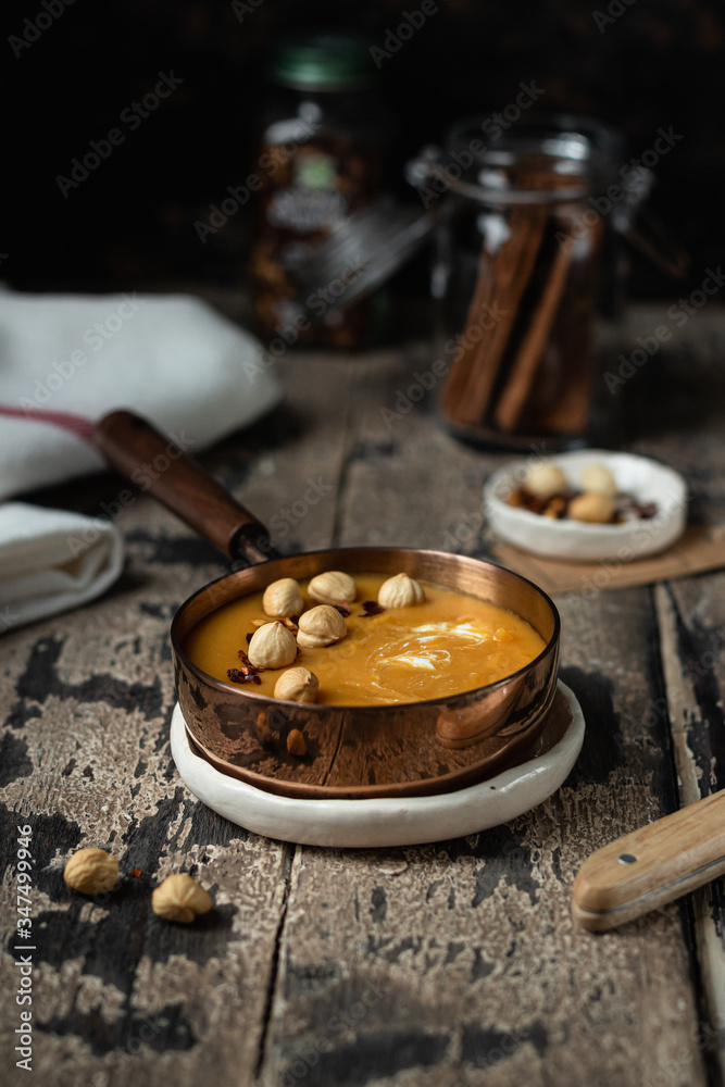 Vegan Carrot Soup with Lentils on a wooden background, selective focus Vegan Carrot Soup with Lentils on a wooden background, selective focus