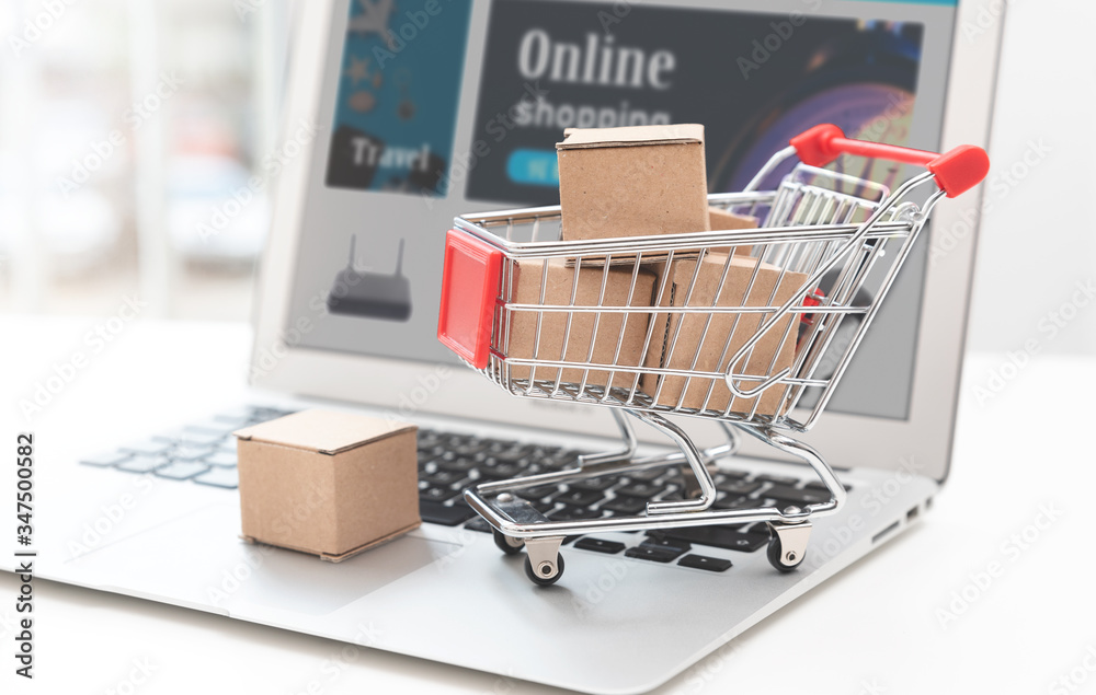 Trolley with boxes. Internet shopping concept