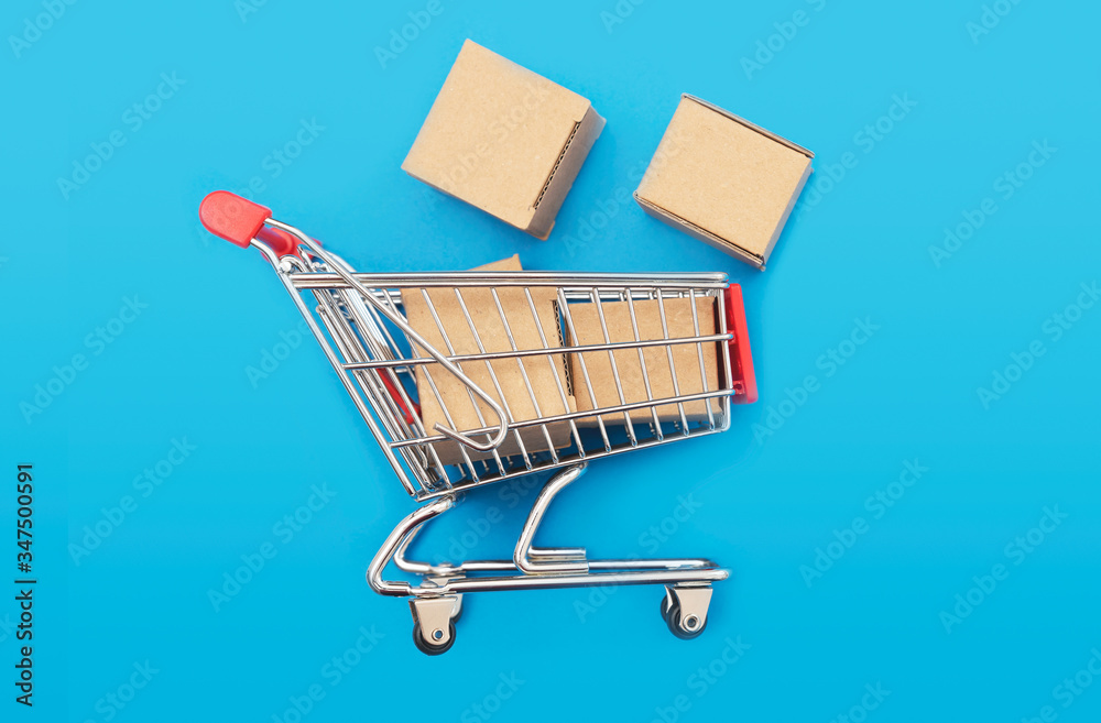 Trolley with boxes. Internet shopping concept