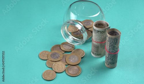 Jar of coins and money. Money saving financial concept  Money Growth. 