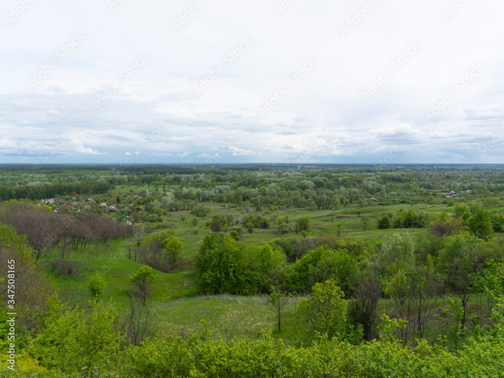 landscape of nature from a height farm village in spring