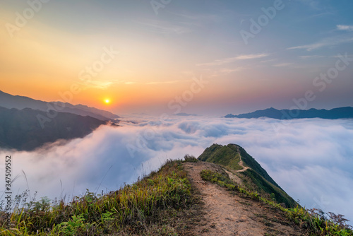 Ta Xua is a famous mountain range in northern Vietnam. All year round  the mountain rises above the clouds creating cloud inversions.