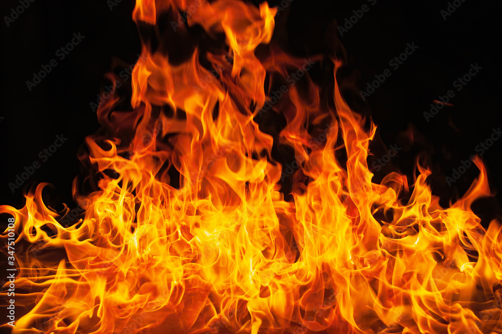 CloseUp Of Fire Against Black Background stock photo