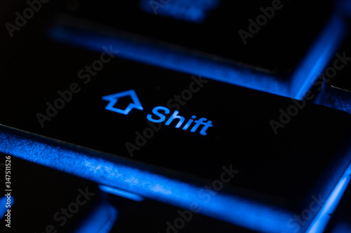 macro shot of a blue keyboard button shift