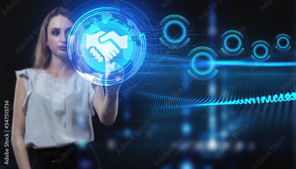 Business, Technology, Internet and network concept. Young businessman working on a virtual screen of the future and sees the inscription: Business, Technology, Internet and network concept. Young businessman working on a virtual screen of the future and sees the inscription: