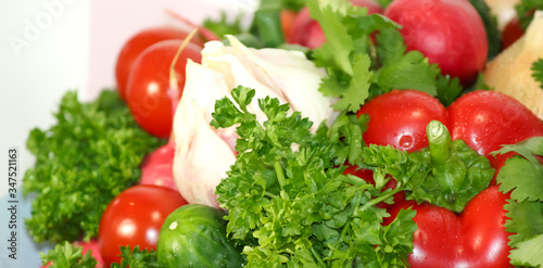 Food grown in a greenhouse garden. Seasonal vegetables.