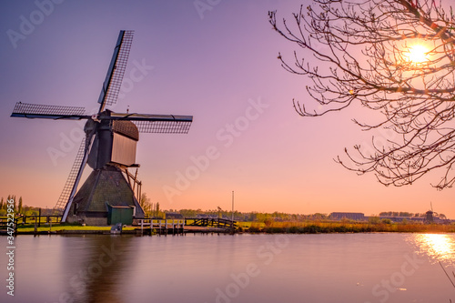 windmills in holland on a sunny day