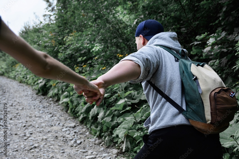 guy and girl in the mountains forest Carpathians beautiful guy and girl in the mountains forest Carpathians beautiful
