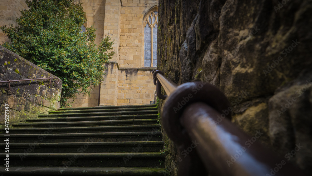 Naklejka premium Climbing stairs to a church.
