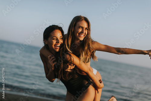 Young women having fun at s...