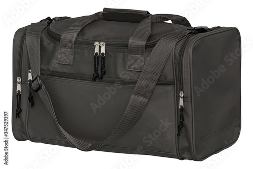 Black travelbag with handles and shoulderstrap for travelling light with clipping path