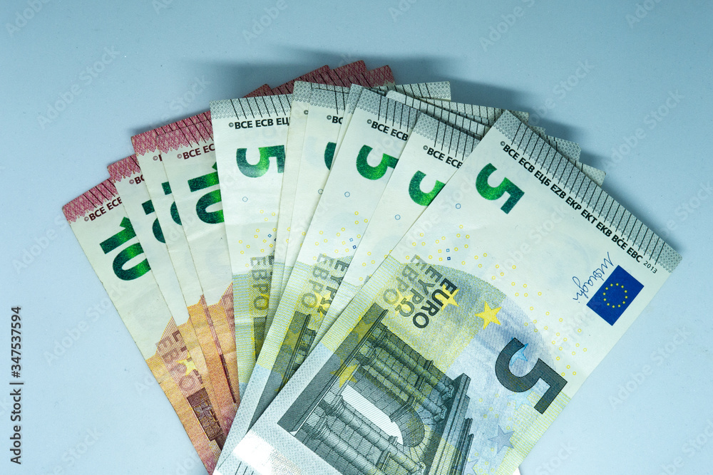 Heap of Euro Bills on white background. Euro Closeup Concept. european Cash Money. Euro Banknotes. Cash of euro bills background. Heap of Euro Bills on white background. Euro Closeup Concept. european Cash Money. Euro Banknotes. Cash of euro bills background.