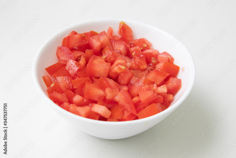 Chopped or Diced Tomatoes in a bowl Chopped or Diced Tomatoes in a bowl
