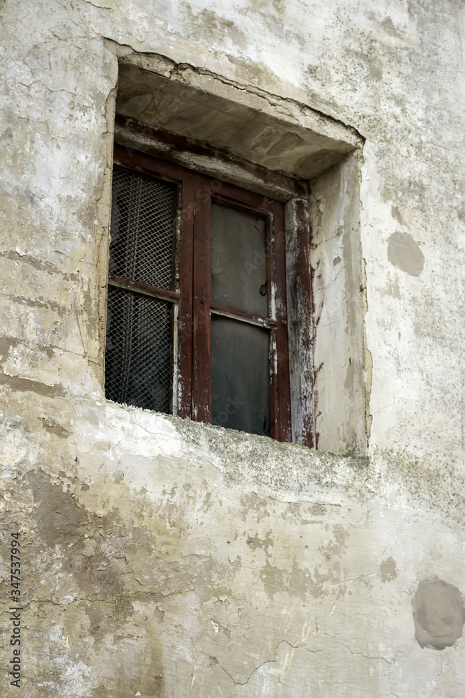 Rustic window with bars