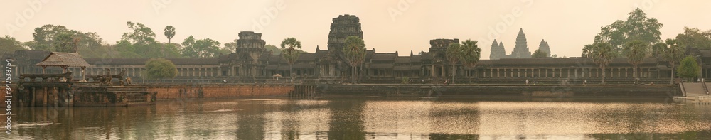 Early morning sunrise panoramic scene of Angkor Wat temple near Siem Reap, Cambodia