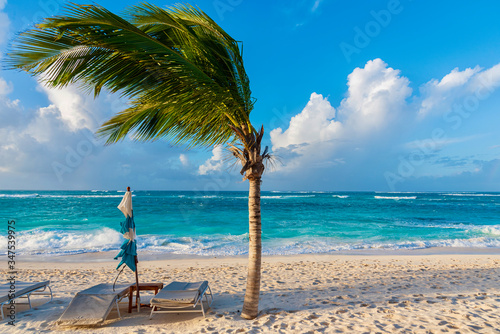 Fototapeta Naklejka Na Ścianę i Meble -  Tropical seascape with sunchair on the beach
