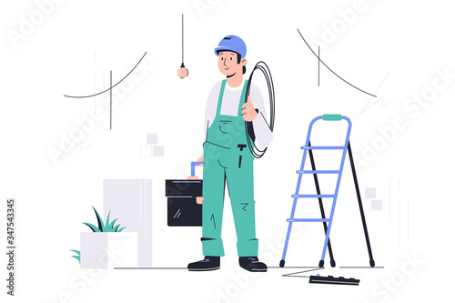 Young happy male employee with equipment looking at completed work.