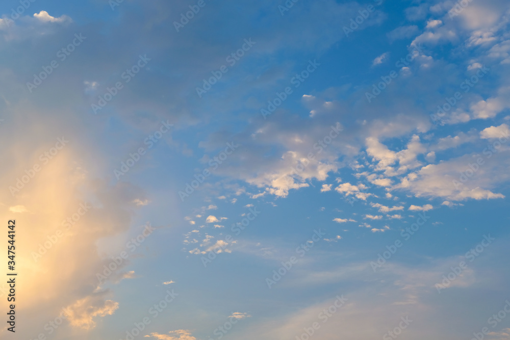 blue sky with golden orange cloud sunset