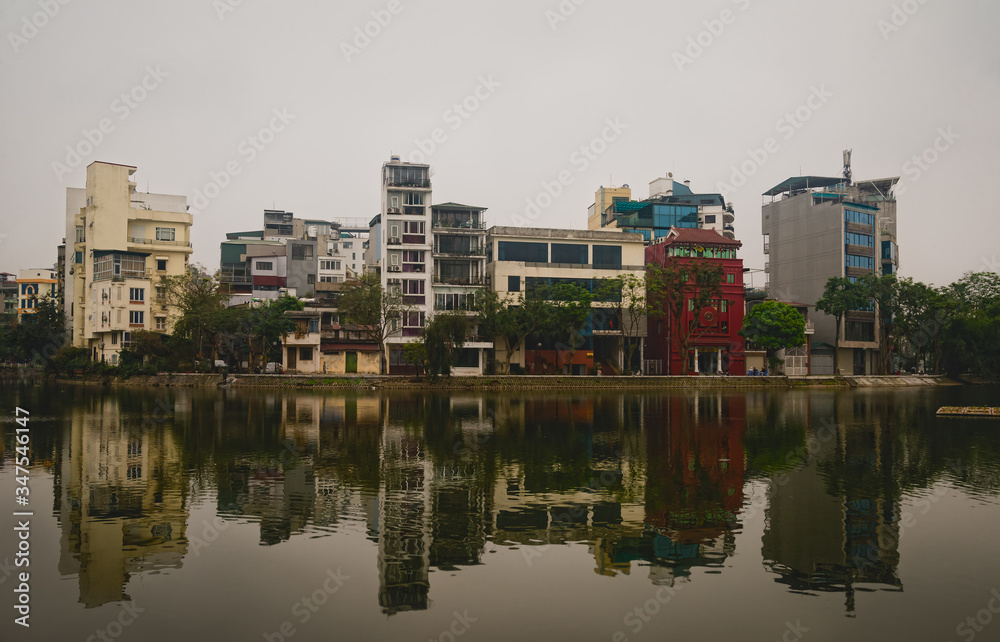 Traditional vietnamese houses and reflection  in Hanoi, Vietnam