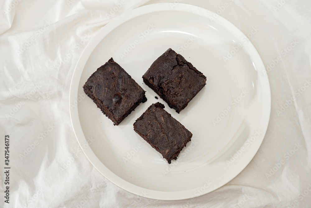 The group of homemade Chocolate Brownies on the white background - Copy Space The group of homemade Chocolate Brownies on the white background - Copy Space