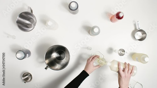 Hand model making natural cosmetics in clean lab. Top down shot 