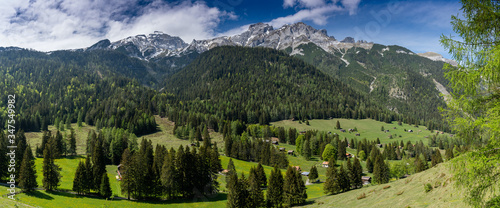 panorama view of an idyllic mountain valley in the heart of the Swiss Alps