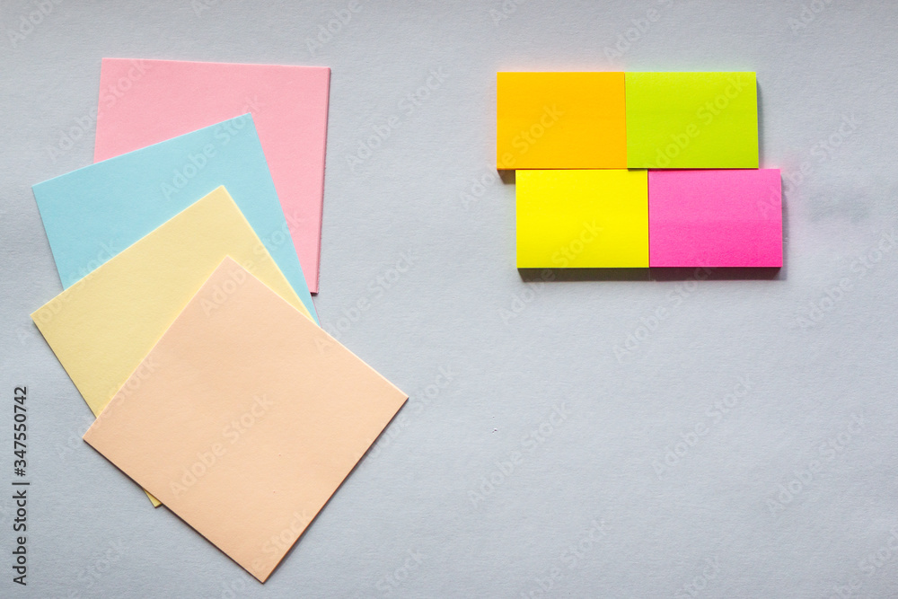 Colored sticky notes on a light background. The view from the top. Space for text. Horizontal photos. Colored sticky notes on a light background. The view from the top. Space for text. Horizontal photos.