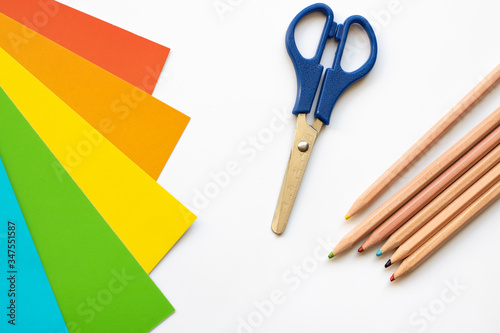 Set for children's craft diy from colored cardboard, paper, scissors and pencils. Template for banner with space for text