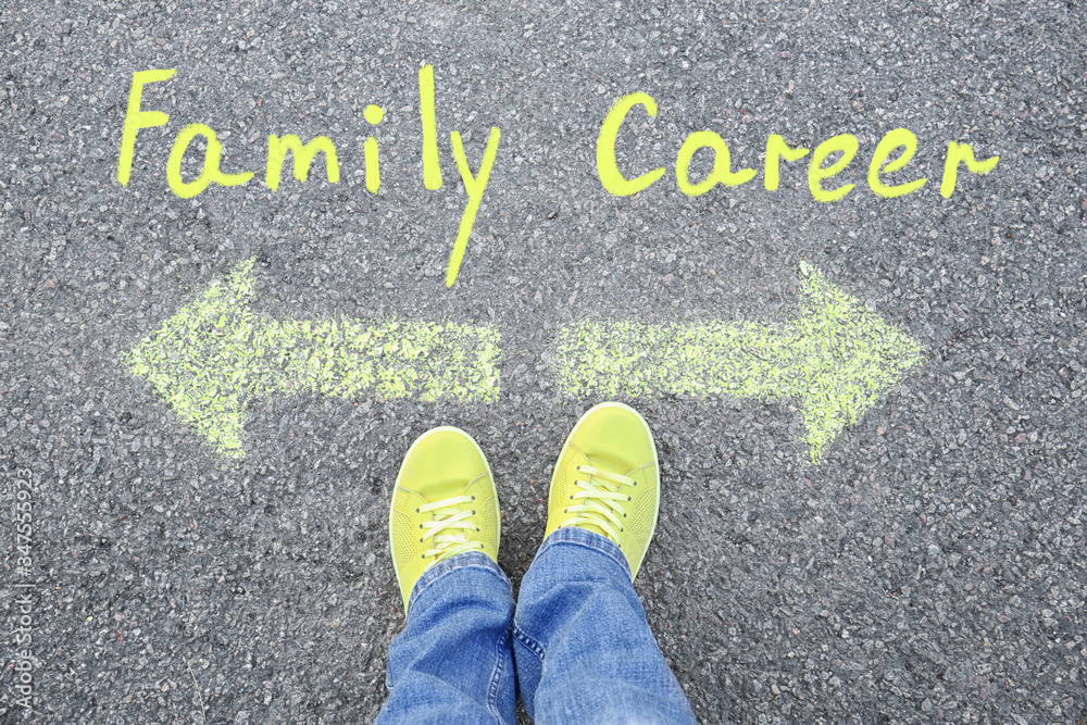 Life choice. Woman on road near arrows with directions to family and career, top view Life choice. Woman on road near arrows with directions to family and career, top view