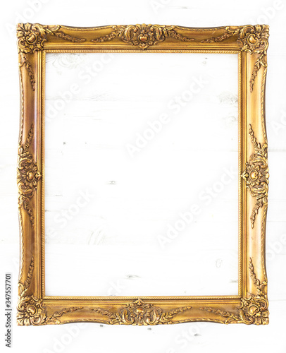 Schilderij op canvas Golden picture frame isolated with copy space
