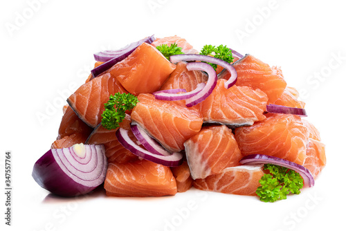 Fresh salmon fillet cubes isolated on white