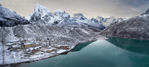Panoramic high resolution image of Gokyo village, Gokyo lake Cholatse and other mountain peaks from Gokyo Ri in Everest region of Nepal.