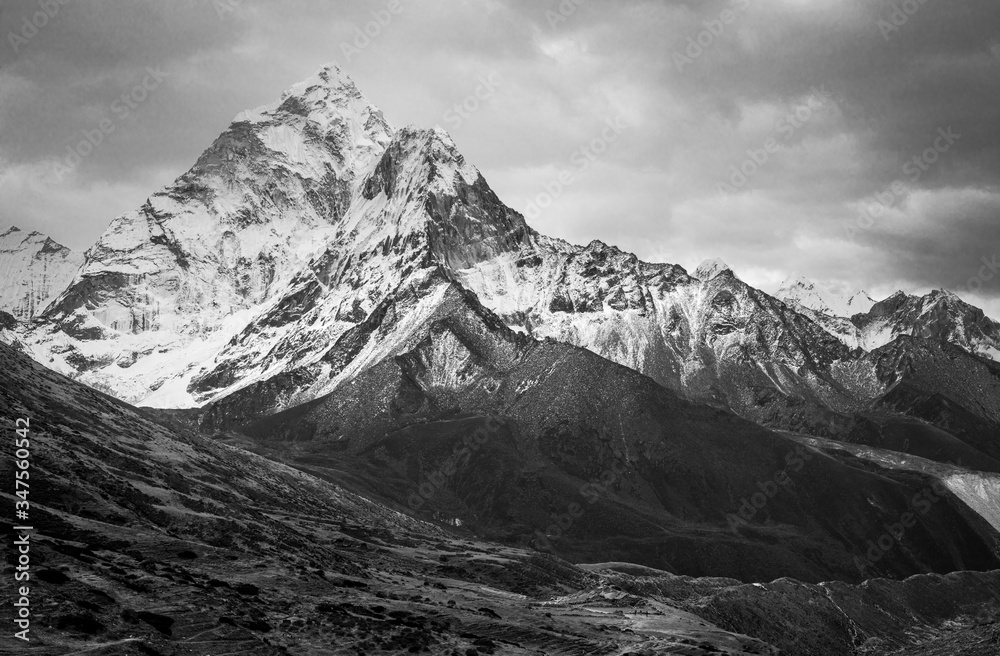 Black and white image of Ama Dablam mountain peak from Dingboche in Everest region during Everest Base Camp trek.