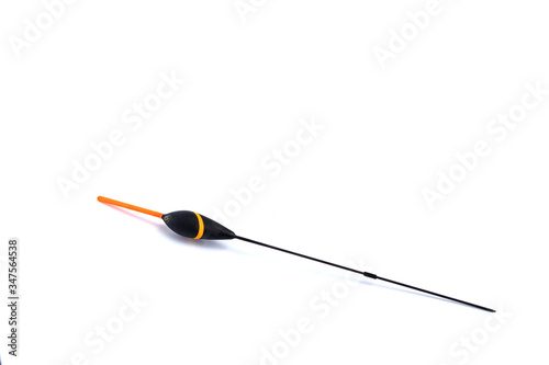 Fishing float with a long keel, for fishing rods on a white background, close-up