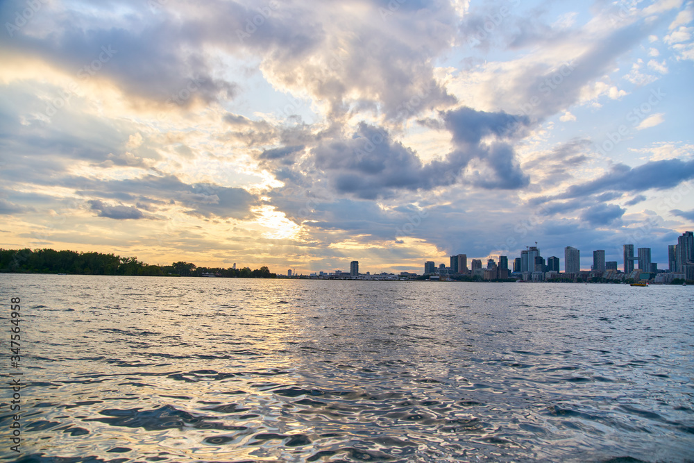 Naklejka premium sunset over the river