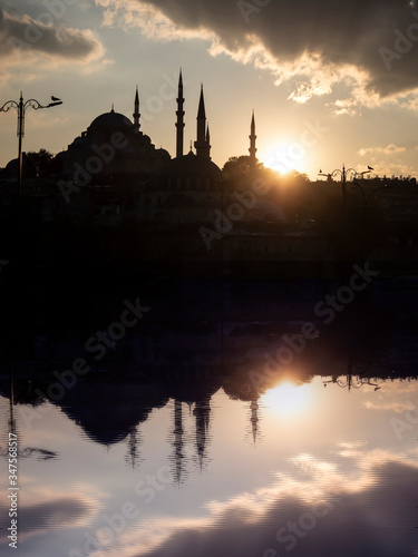 Suleymaniye mosque in Istanbul, Turkey, at sunset with a reflection. Close up.