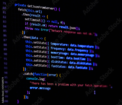 Modern Javascript, Typescript, Ecma script code with React Framework. Async with fetch. Software programming source code on computer screen.. photo