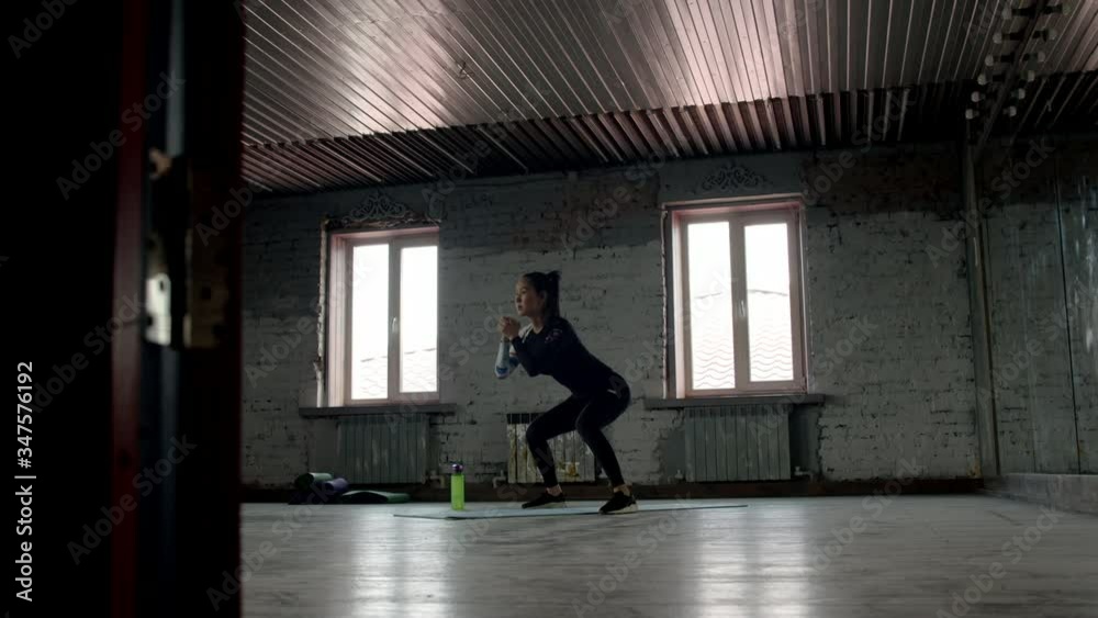 asian girl training in a big room alone asian girl training in a big room alone