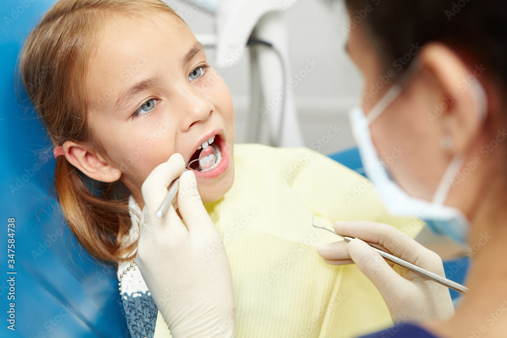 Little girl on a visit to the dentist in office of pediatric dentistry. Little girl on a visit to the dentist in office of pediatric dentistry.