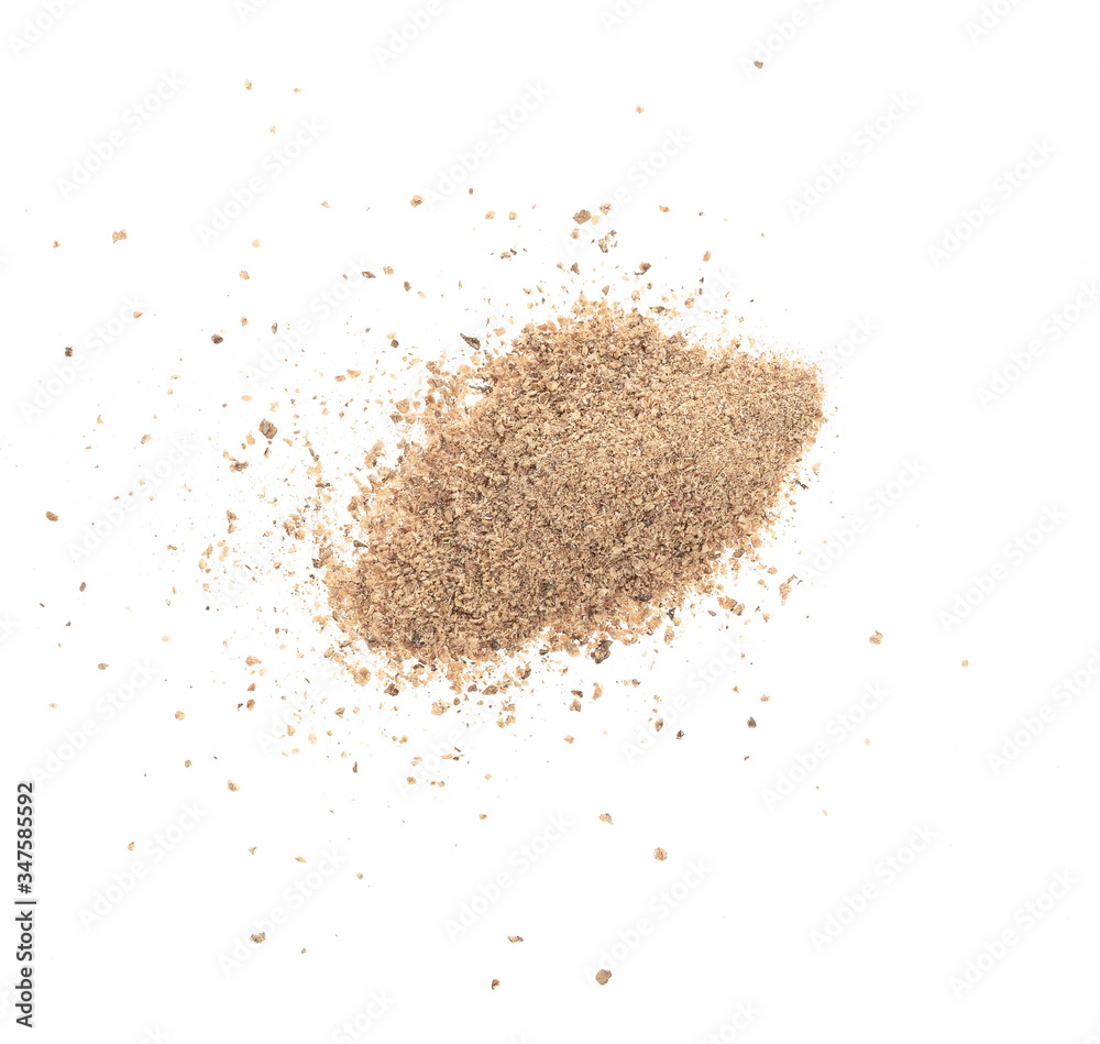 Nutmeg powder on white background top view Nutmeg powder on white background top view
