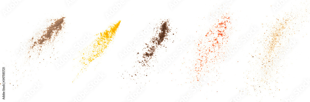 set of red peppers, turmeric, cocoa powder, nutmeg isolated on white background, top view texture set of red peppers, turmeric, cocoa powder, nutmeg isolated on white background, top view texture