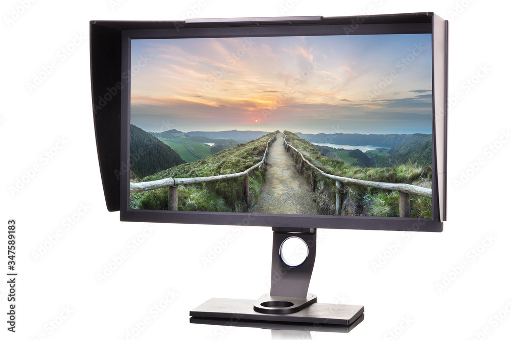 Fototapeta premium Professional photographer monitor with shading hood isolated on white