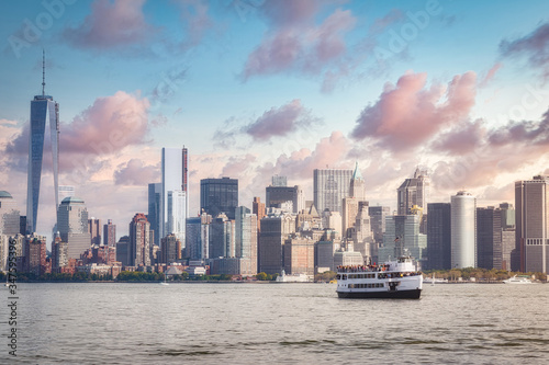 New York City lower Manhattan skyline from the tourist ferry, Usa.